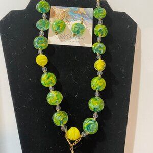 Green and yellow lamp work beads on gold chain necklace with earings